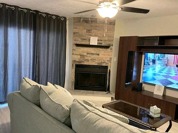 Wood burning fireplace in living room