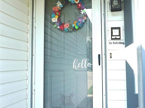 Welcome to 175 Autumn Chase! Covered front porch has new aluminum on the architectural details.