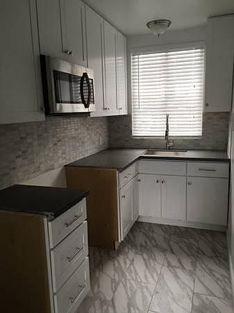 Also includes new stove (not in photo due to late delivery