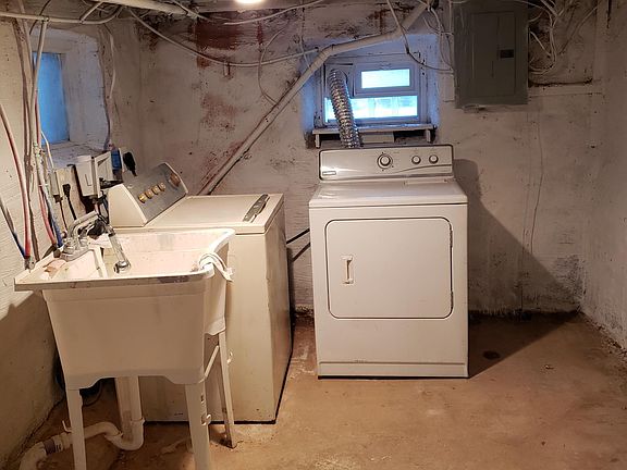 Basement with washer and dryer