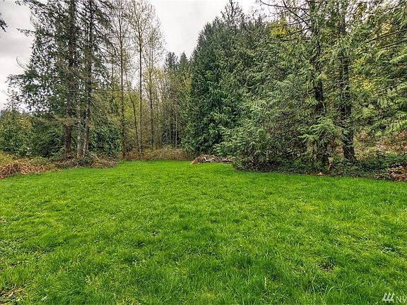 With a level field in the foreground and forested hillside behind, this property provides such a great variety of terrain!