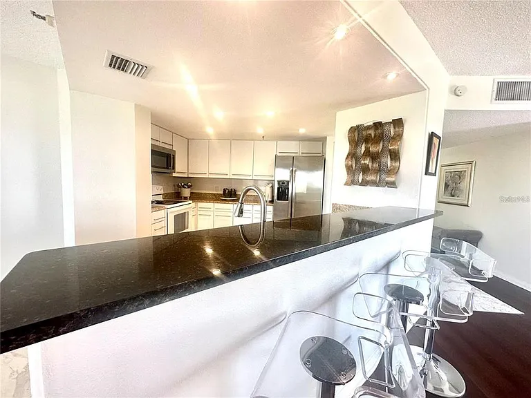 5950 Pelican Bay Plz S #505 — Photo 46