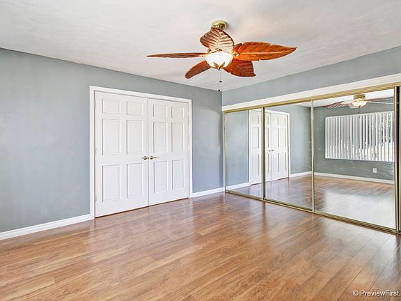Living rm w/mirrored closet