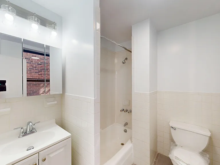 417 E 65th St #20 — Photo 11