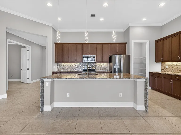9318 SW Miracoli Way — Photo 18