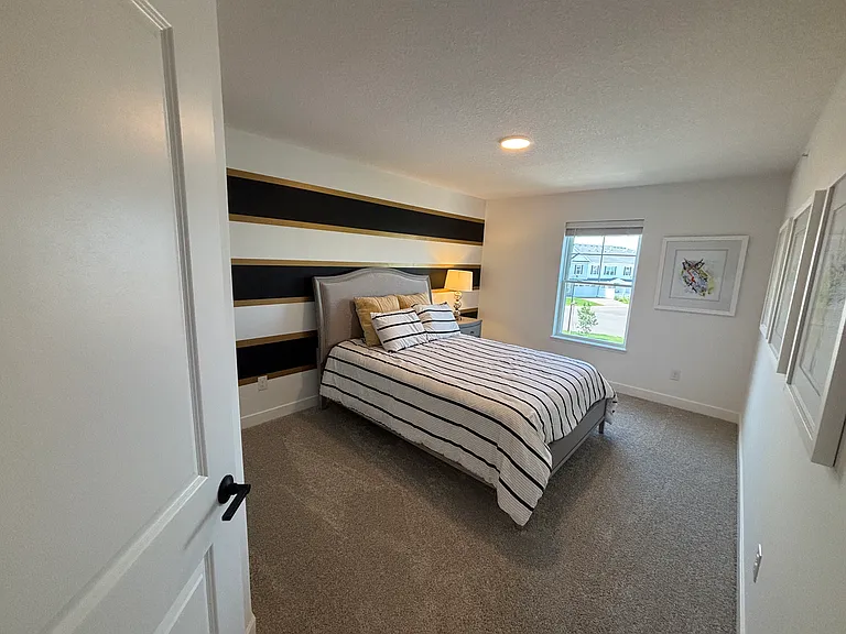 Bedroom - Model-home photos shown. Actual home may differ in finishes and upgrades.