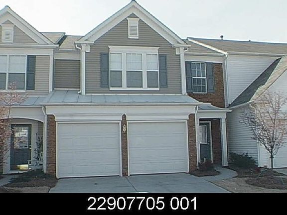 Front with 2 car garages