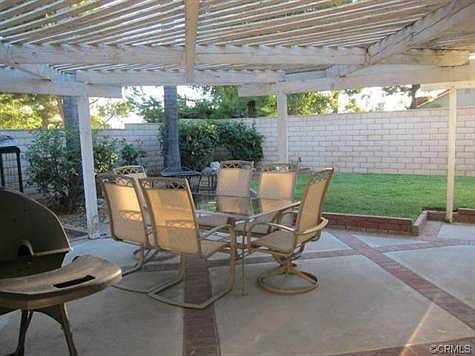 Covered Patio With Brick In-lay