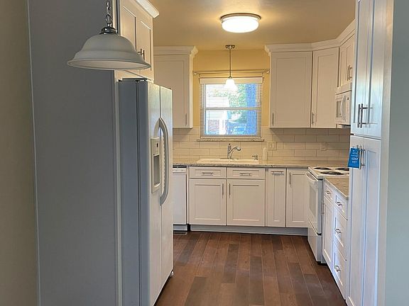 Kitchen view from den/dining/bonus room.