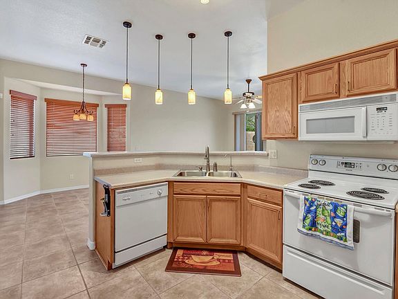 Kitchen open to eating bay