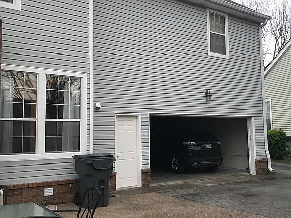 Back of house showing garage