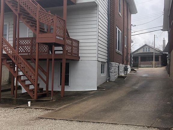 Rear viewof 816 Clark with concrete drive leading to off street parking