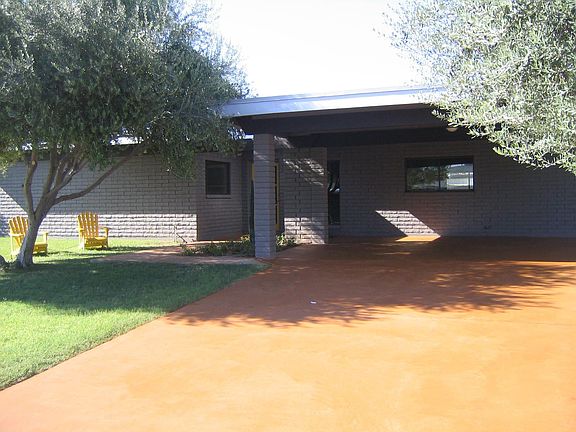 stained concrete drive. street view