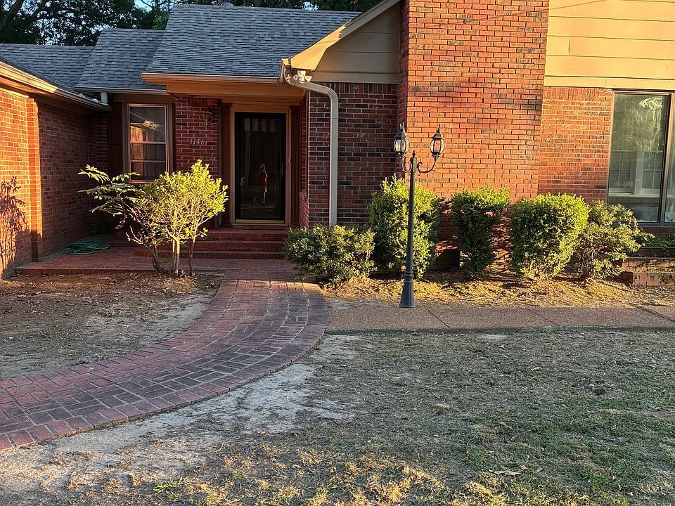 Front view of house, including the front porch. Chimney is no longer used for fires.