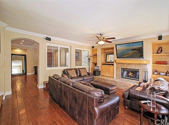 Spacious family room with custom built-ins