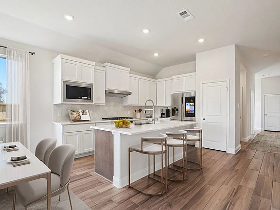 Homesite 2228 Kitchen Dining - Staged