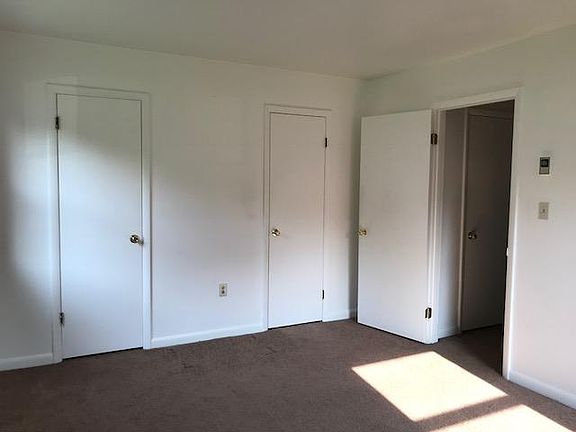 bedroom, two closets and two windows