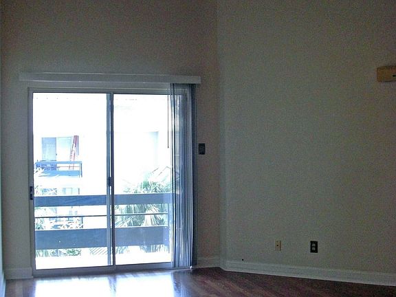 Living room with vaulted ceilings.