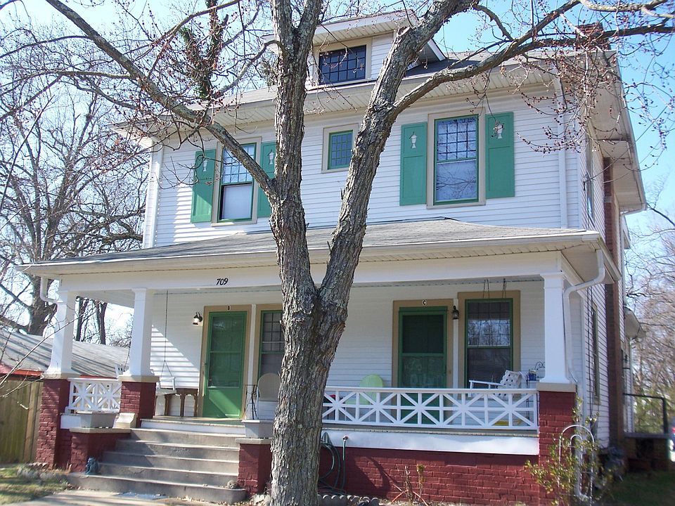 Front of house w/ swings