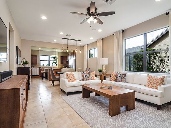 Model Representation Open gathering room with tile porcelain tile flooring