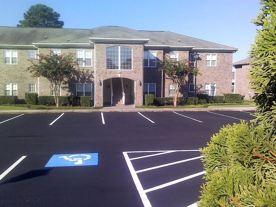 unit is ground floor corner - has covered entrance for inclement weather protection