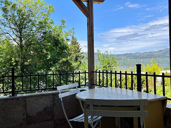 Enough space for lounging chairs and table and chairs for meals.