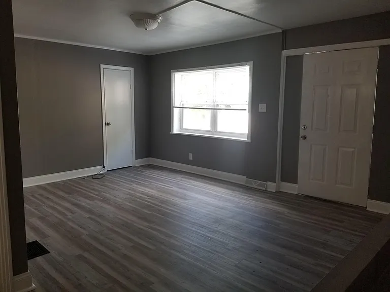 Living Room w/ access to private deck