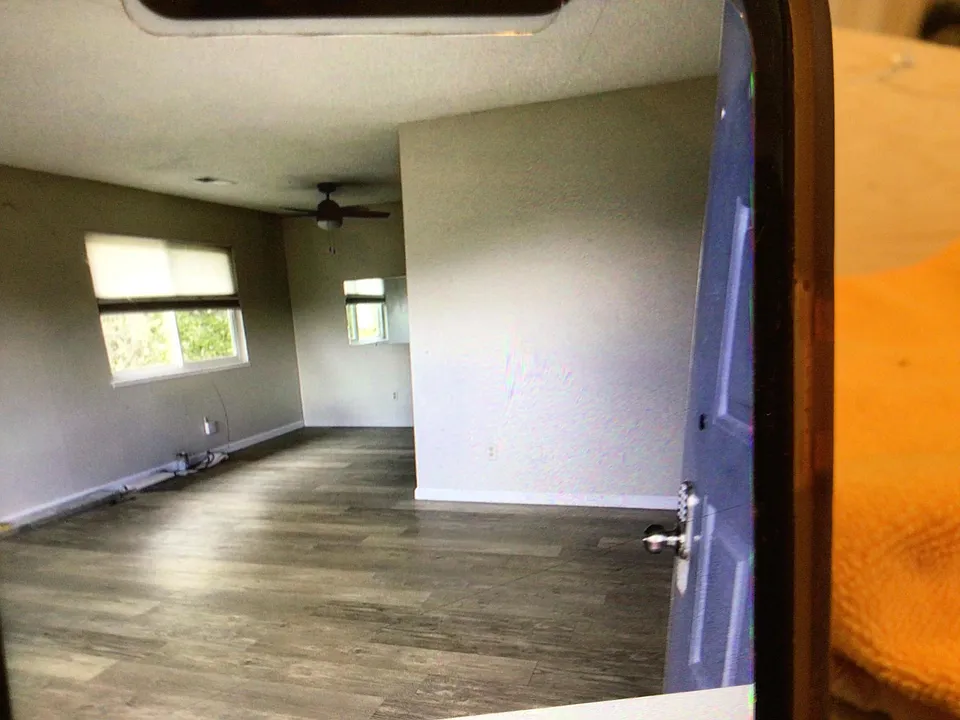 front door looking into living room and dining room