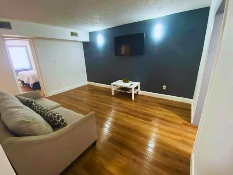 Spacious and sun-filled living area designed for comfort and relaxation.