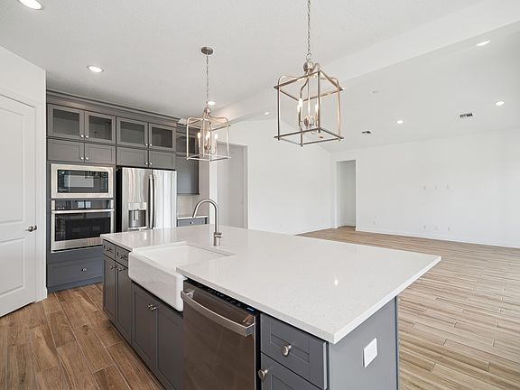 Kitchen with upper glass cabinets