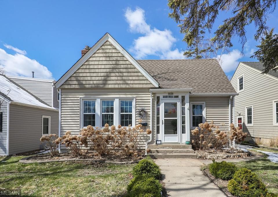 Photo of front of house, taken in Summer