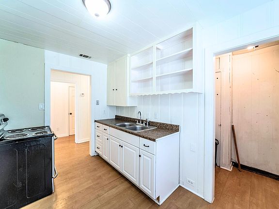 Kitchen with storage and side entrance
