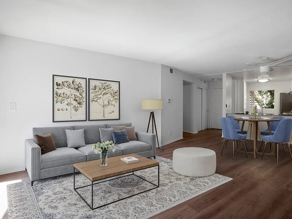 Renovated Package I living and dining room with hard surface flooring