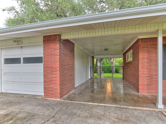 Breezeway with new iron gate