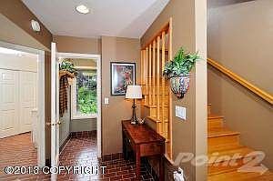 Large Tiled Entry with Mudroom