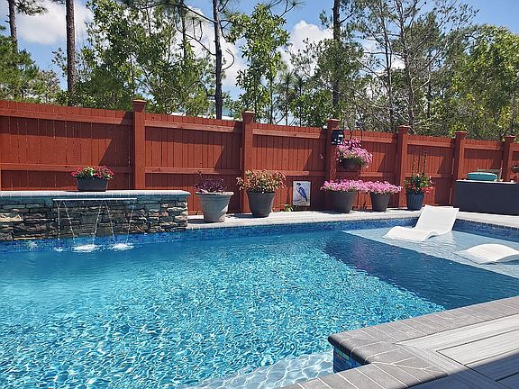 Pool waterfall & lounge deck