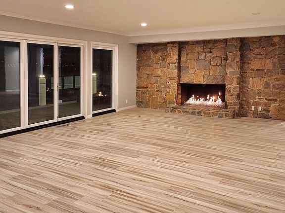 Spacious Oversized Living Room with Fireplace and Views of the Back Bay Main Channel