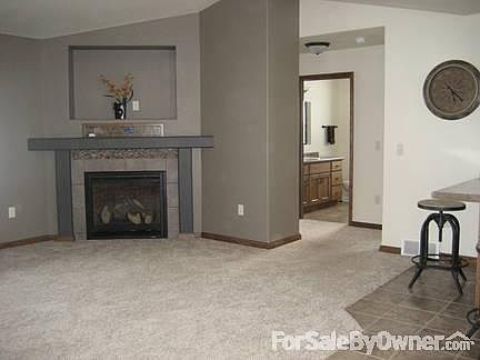 Living Room
						:
						Gas fireplace/TV above fireplace.