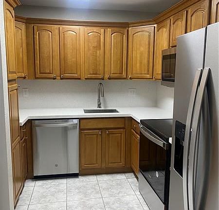 5th image of 8761 Shadowwood Blvd #203
