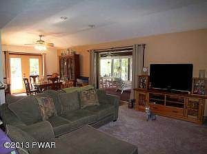 Living room dining room and sunroom