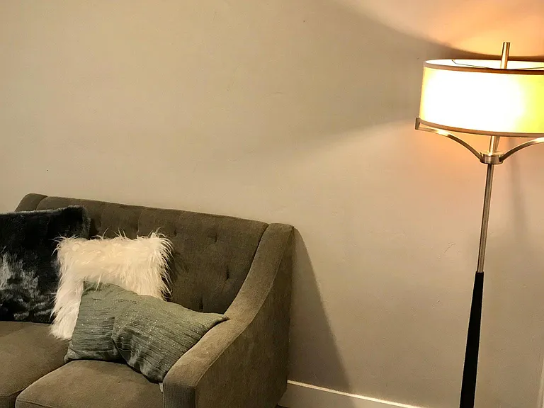 Entrance area can accommodate a small sofa. Space to mount a TV on the opposite wall!