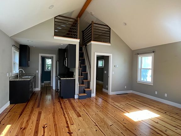 Living room with loft access