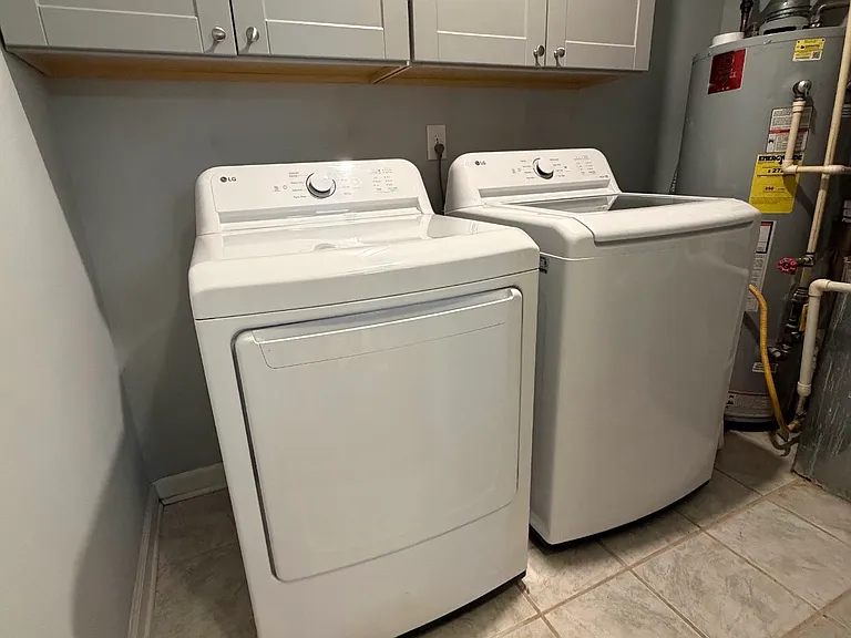 Laundry room with new washer/dryer