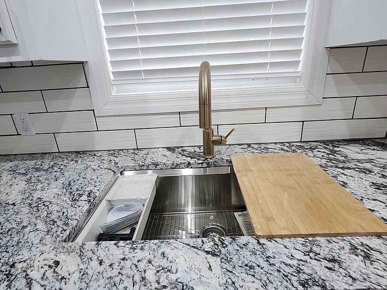 Luxury kitchen sink with Quartz countertops