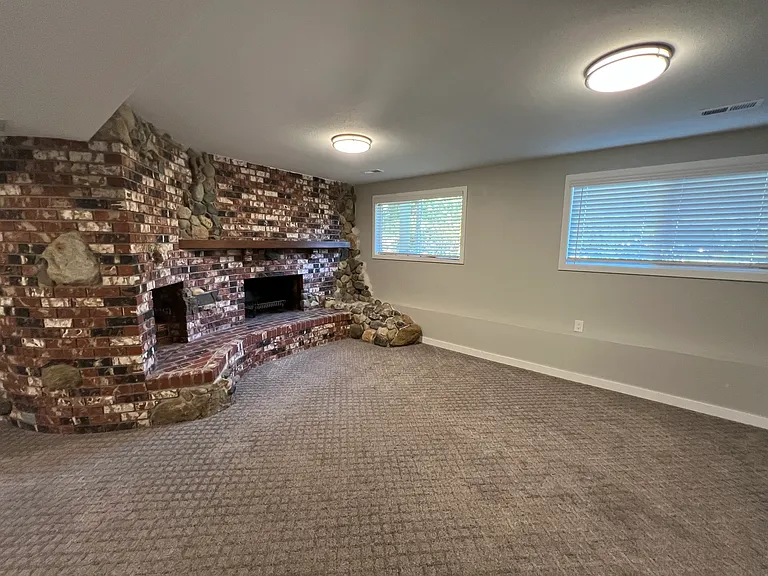 Lower Level Living/Rec Room Photo 2
(Not approved for fireplace fires)