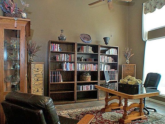 office / den with vaulted ceiling