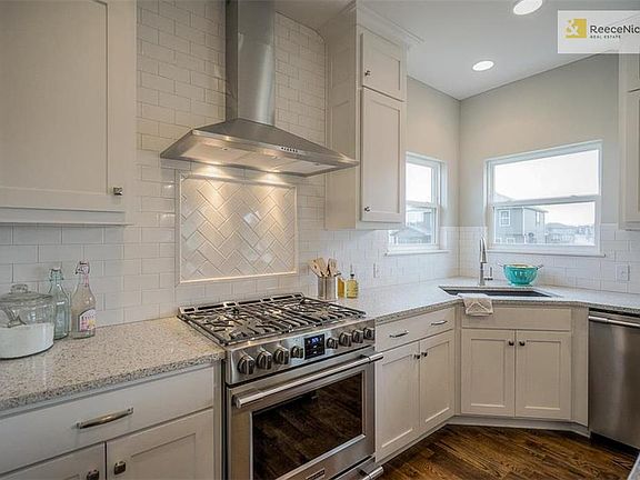 Gourmet Kitchen featuring a Gas Range and Hood Vent!