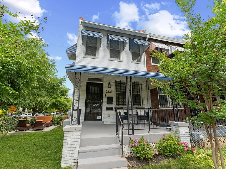 Welcome to this renovated 3 BR, 2.5BA end-unit with 4-car pkg & walking distance to Metro!