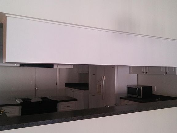 Open kitchen with tons of cabinet and counter space.