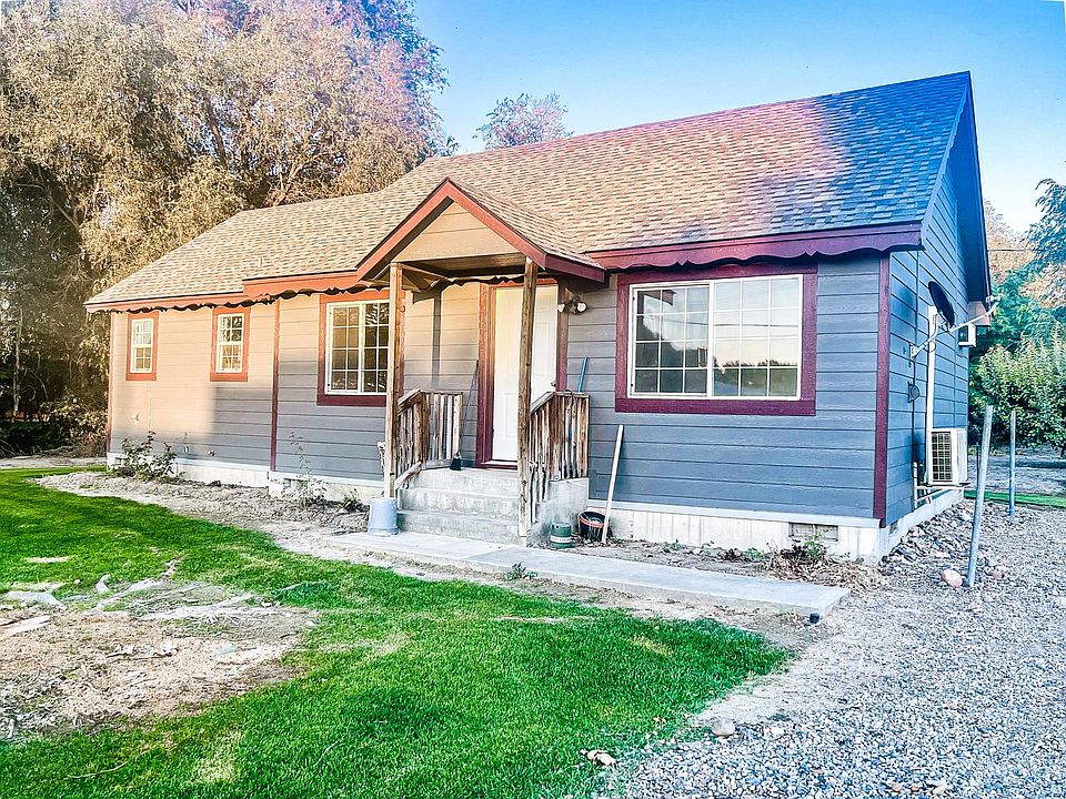 FRONT: Efficient windows and yard maintenance included in rent!